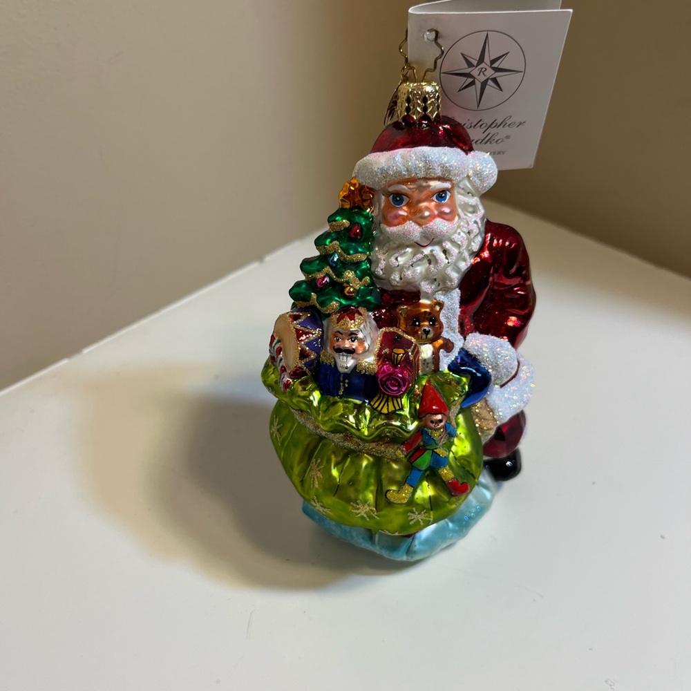 Christopher Radko Red-and-White Santa with Green Toy Sack Ornament